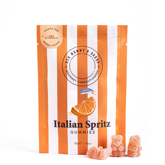 NaniManu Italian Spritz Gummis von Ask Mummy & Daddy – Vorderseite des Beutels mit Orangenschnitz und Sonnenschirm, 50 g