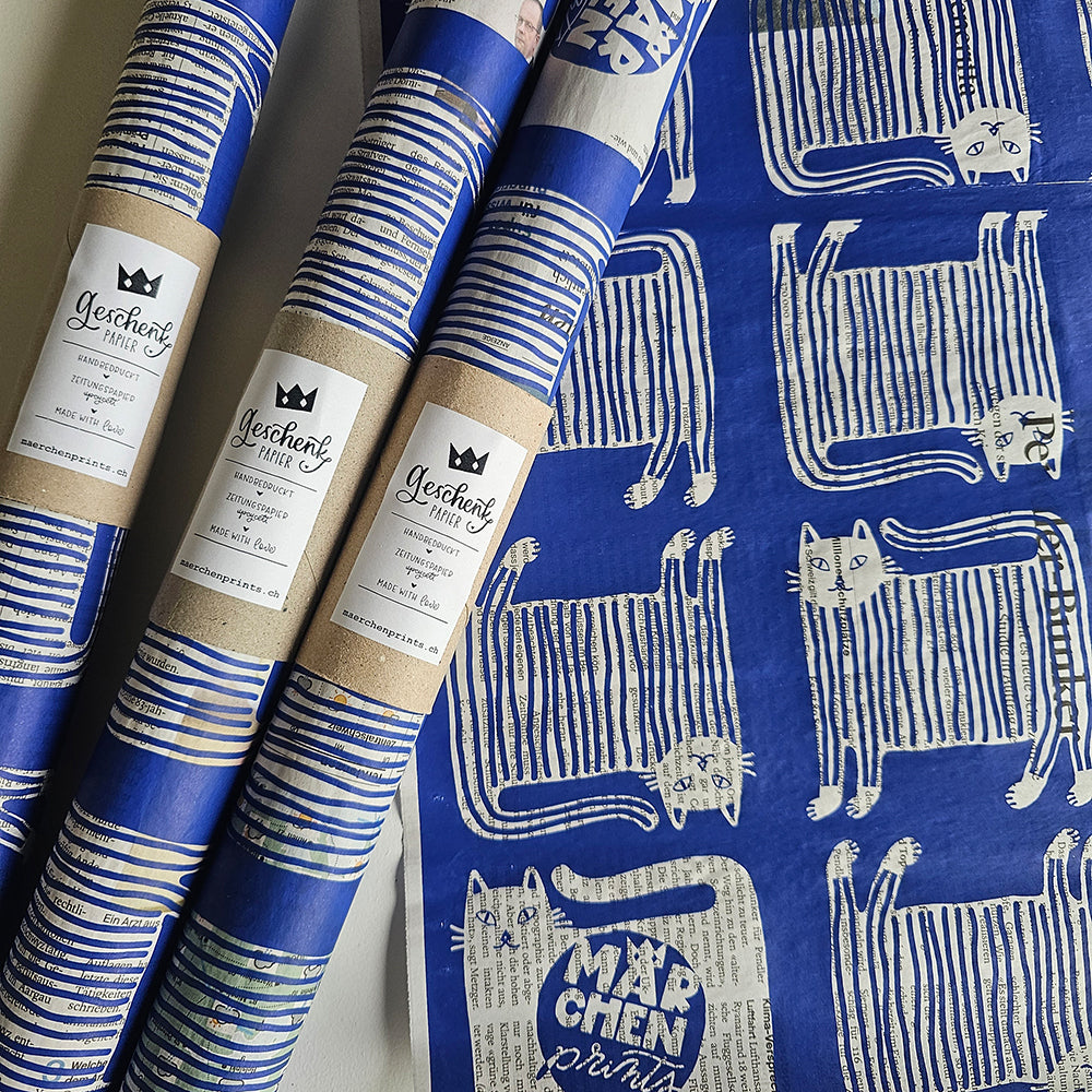 Three rolls of «Puss in Boots» wrapping paper with Märchenprints label