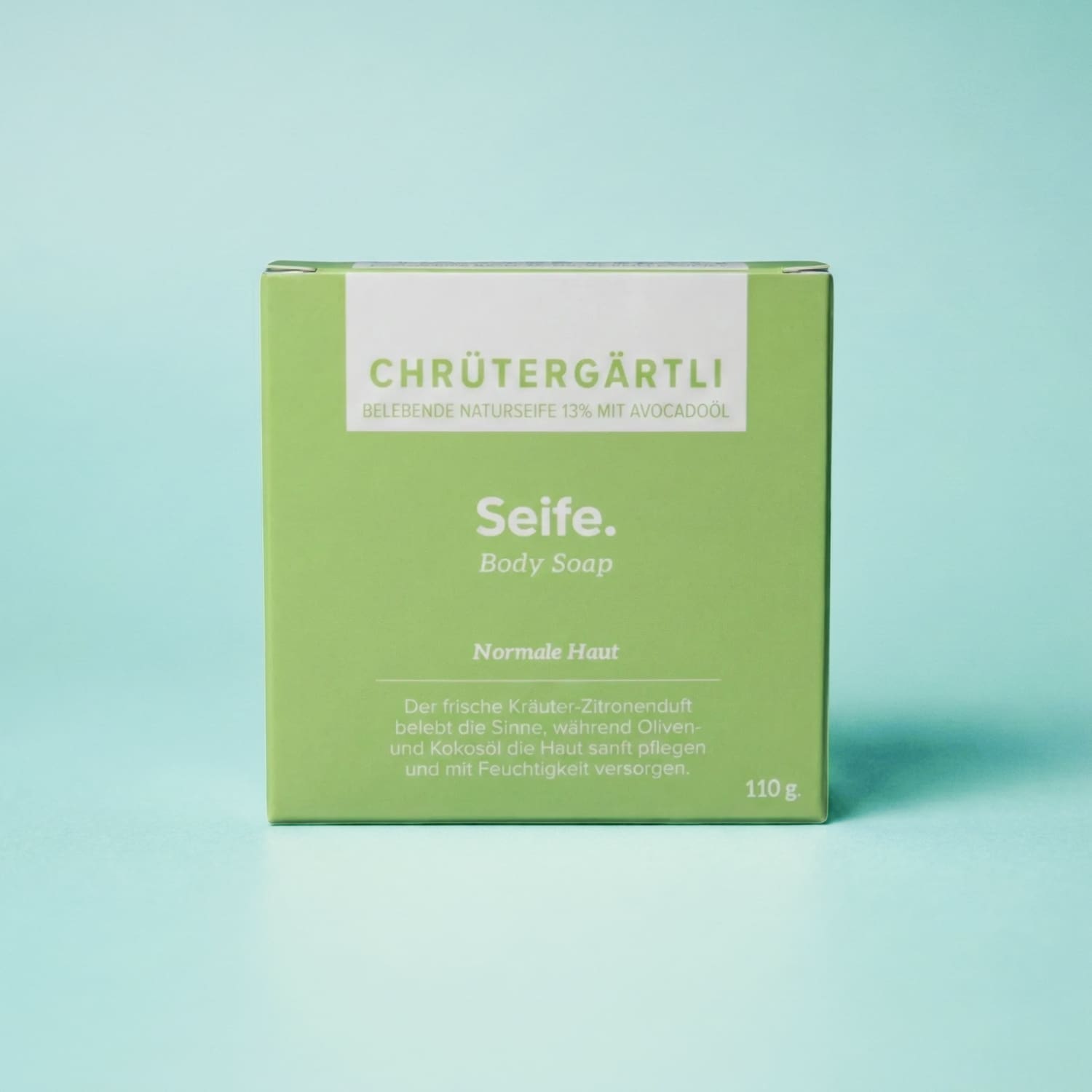 Naturseife Chrütergärtli von Natur i de Hand – grüne Kartonschachtel mit Aufschrift «Chrütergärtli – Seife – Body Soap», 110 g