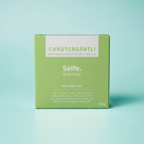 Naturseife Chrütergärtli von Natur i de Hand – grüne Kartonschachtel mit Aufschrift «Chrütergärtli – Seife – Body Soap», 110 g