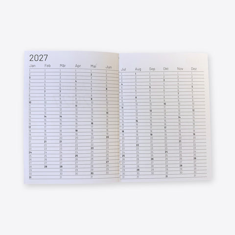 Year overview 2027 in the agenda – twelve month columns across a double page